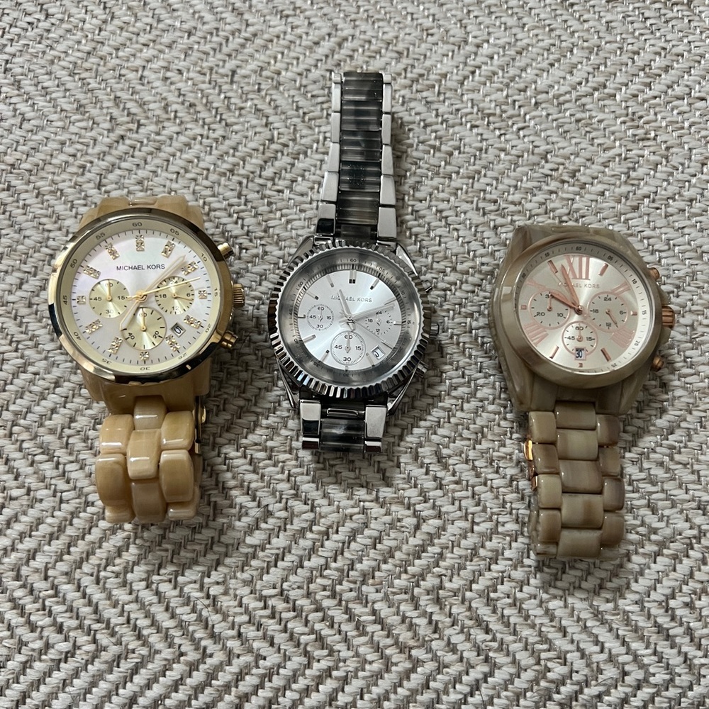 Collection of Michael Kors watches.